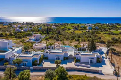an aerial view of a villa with the ocean in the background at Villa Margarita Gennadi in Gennadi