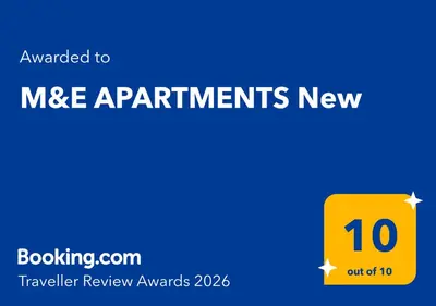 a yellow box with the text mce applications new at M&E APARTMENTS New in Haraki