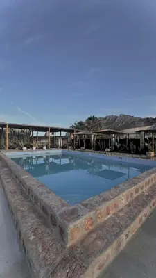 a large swimming pool in the middle of a building at LA Casa Di Lusso Casa N1 Adults Only in Kolimbia