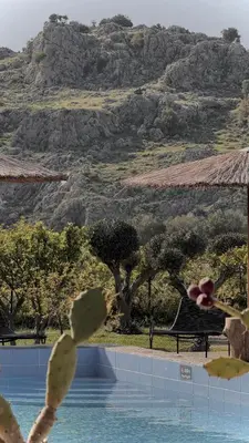 a view of a pool with a mountain in the background at LA Casa Di Lusso Casa N2 Adults Only in Kolimbia