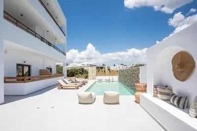 an image of a villa with a swimming pool at Zaia Suites & Living, Suite N3, pool view, central in Gennadi