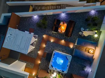 an aerial view of a living room with a tv at Sunny Nest Apartments in Ixia