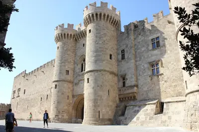 a castle with people standing in front of it at Loft 146 in Rhodes Town