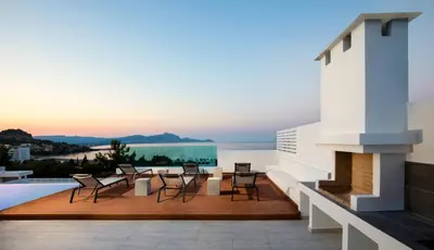 a view from the roof of a house with a fireplace at Villa Emerald with swimming pool in Lindos in Líndos