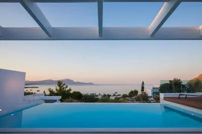a swimming pool with a view of the water at Villa Estella with pool & jacuzzi in Lindos in Líndos