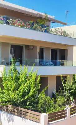 a building with plants in front of it at Villa Pavlina in Ixia