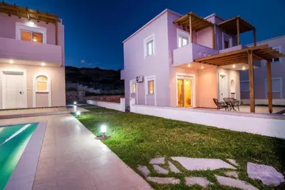 a large house with a yard with a swimming pool at Villa Regina - Double Pool Paradise in Lachania